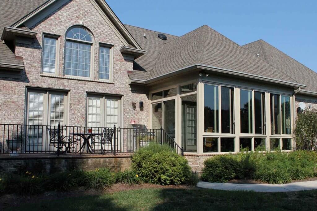 beautiful brick house with a veranda